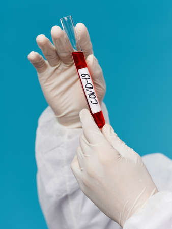 Laboratory blood test covid-19 biotechnology blue backgroundの写真素材