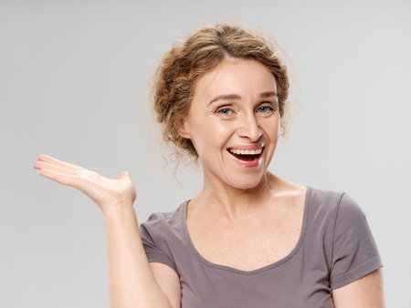 cheerful woman old age tin plate other emotions studioの写真素材