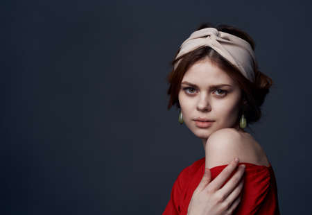 Elegant woman red dress luxury glamor decoration attractive lookの写真素材