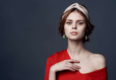 elegant woman glamor red dress cosmetics decoration ethnicityの写真素材