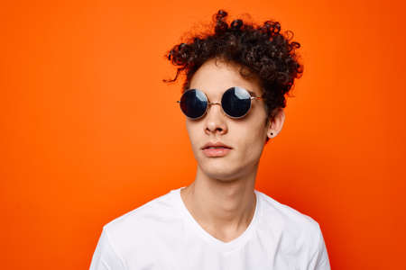 handsome man with firewood hair sunglasses fashion close-upsの写真素材