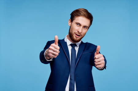 Cheerful male manager in fashion suit hand gesture