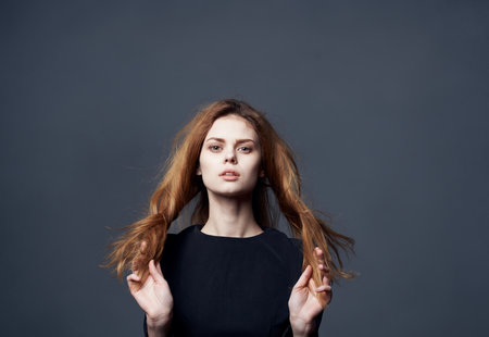 Pin-up woman beautiful hair elegant style cropped lookの写真素材