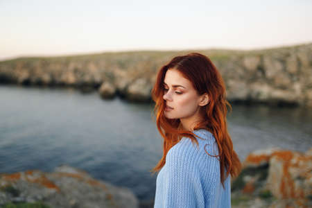 woman outdoors rocky mountains fresh air freedom lifestyle