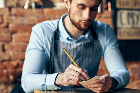 barista coffeeshop order acceptance service professional workの写真素材