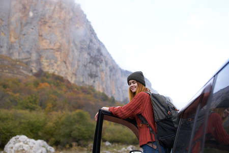 woman hiker near car journey trip nature mountains