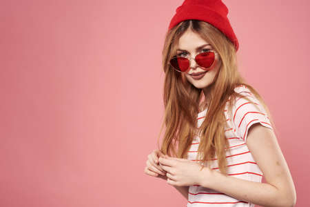 Fashionable woman Glamor elegant style cropped look pink backgroundの写真素材