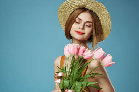 Beautiful woman charm bouquet of flowers gift spring holidayの写真素材