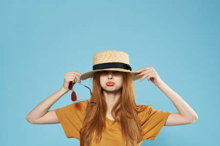 Cheerful woman in hat elegance glasses fashion emotionsの写真素材