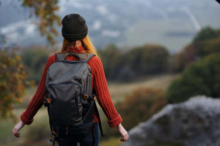 woman hiker backpack landscape vacation lifestyle natureの写真素材