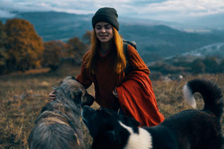 woman hiker travel vacation walk dog mountainの写真素材