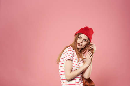 Cheerful woman studio lifestyle pink background fun modelの写真素材