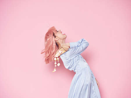 cheerful woman pink hair and candy sweets luxury emotions Studioの写真素材