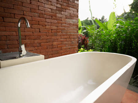 bathroom outdoors and interior design iron faucet brick wallの写真素材