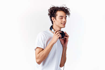 funny man curly hair headphones music technologyの写真素材