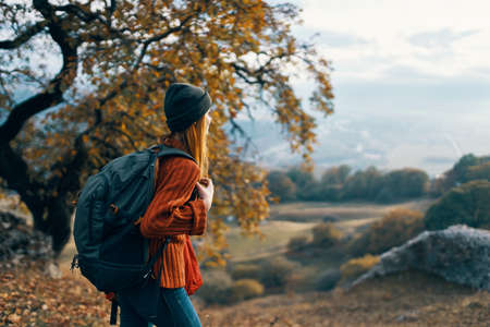 woman hiker landscape travel mountains autumn forestの写真素材