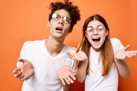 funny man and woman in t-shirts joy of communication fashion styleの写真素材