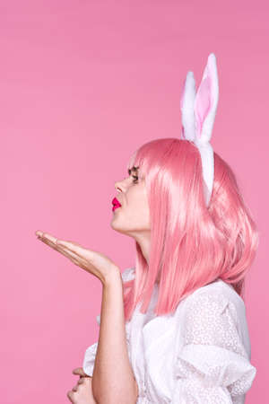 woman with hare ears and pink hair fun cute appearance modelの写真素材