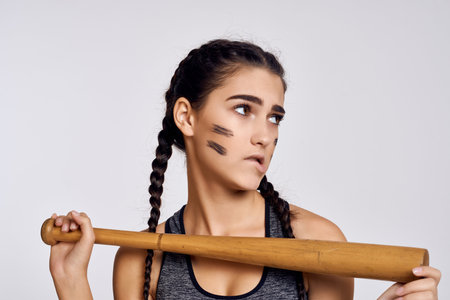 sportive woman with baseball bat workout exercise studio