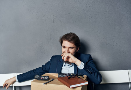 business man manager box with things depression dismissal careerの写真素材