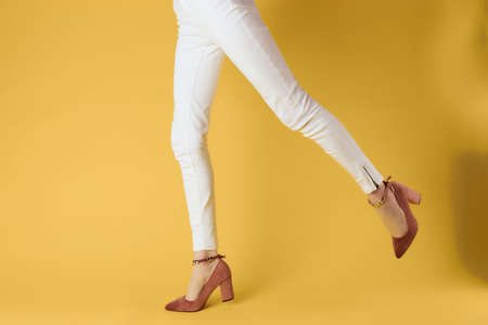 female legs in shoes posing fashion luxury elegant styleの写真素材