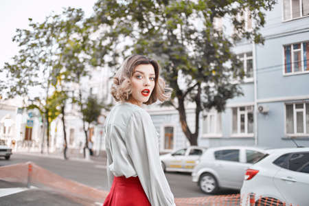 pretty woman outdoors red lips walk lifestyle posing