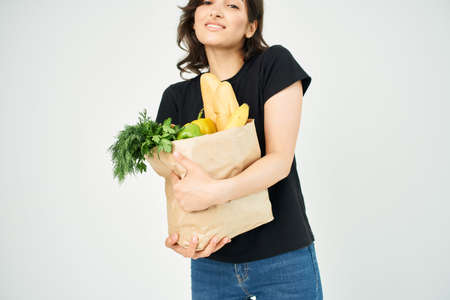 food bag vegetables supermarket light backgroundの写真素材