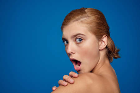 woman with bare shoulders clean skin care close-upの写真素材