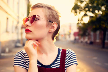 pretty woman outdoors short haired fashion posingの写真素材