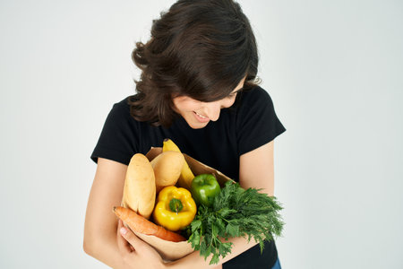 brunette with a package of groceries homework healthy food supermarket