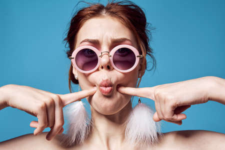 joyful woman shoulders emotions studio fashion posingの写真素材