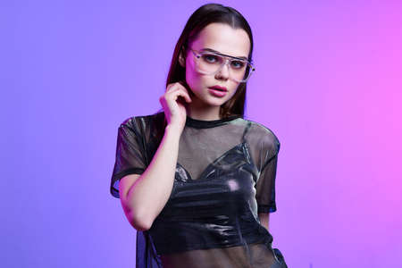 woman fashion clothes disco luxury posing bright makeup neon background