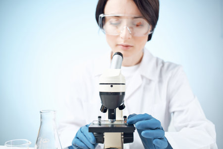 woman laboratory assistant microscope science professional analysis biotechnology