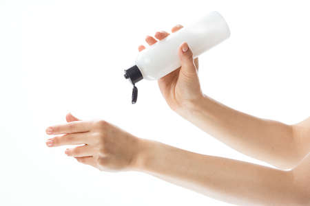 cream jar skin care hand lotion cosmetics light background