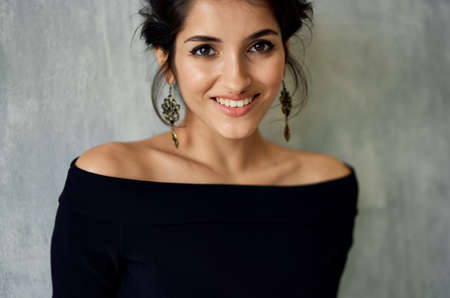 attractive woman in black dress smile fashion luxury