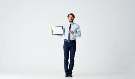 bearded man in shirt with tie papers work officeの写真素材