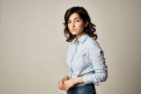 brunette package with groceries from the supermarket diet food delivery to dark background