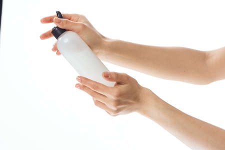 woman with lotion in hands skin care cosmetology moisturizingの写真素材