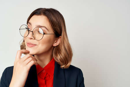 Business woman in suit gesturing with hands emotions work manager close-upの写真素材