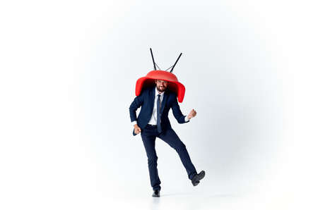 business man in suit red chair overhead office workの写真素材