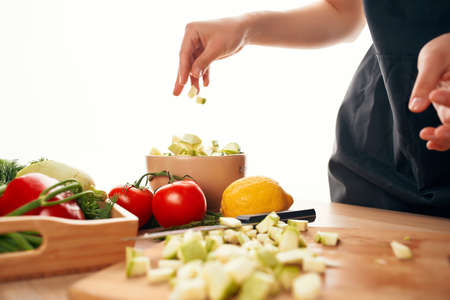 cutting vegetables on a cutting board kitchen close-up fresh
