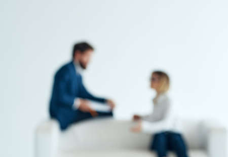 business men and women sitting on the couch communication work team