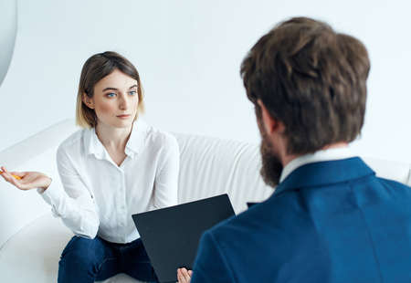 man and woman communicate work team documentsの写真素材