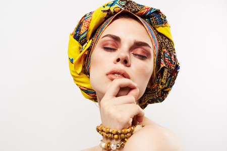 pretty woman multicolored turban ethnicity fashion posingの写真素材