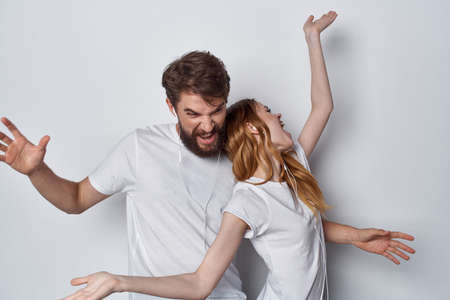 man and woman in white t-shirts communication friendship together family i