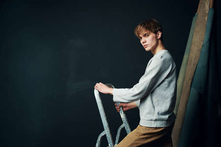 guy stands on the stairs studio lifestyle renovationの写真素材