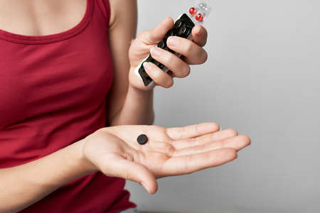 woman with stool in hand treatment pharmacy lifestyle therapyの写真素材