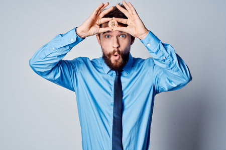 man with gold coin finance office managerの写真素材