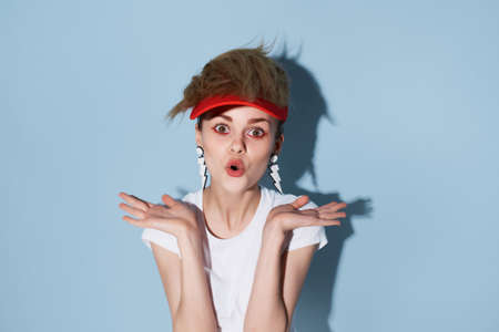 pretty woman in red cap studio fashion luxury close-upの写真素材