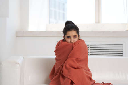 sick woman at home health problemsの写真素材